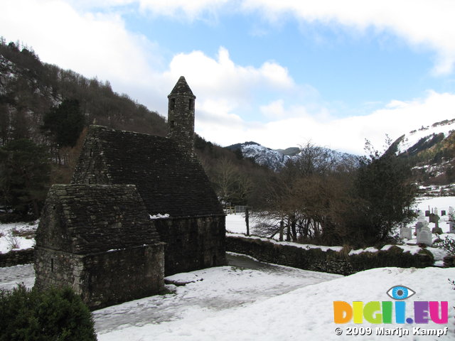 SX02772 Glendalough St Kevin's Church in snow